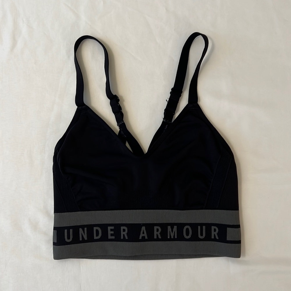 Under Armour, women’s sports bra, size small, black and gray color.